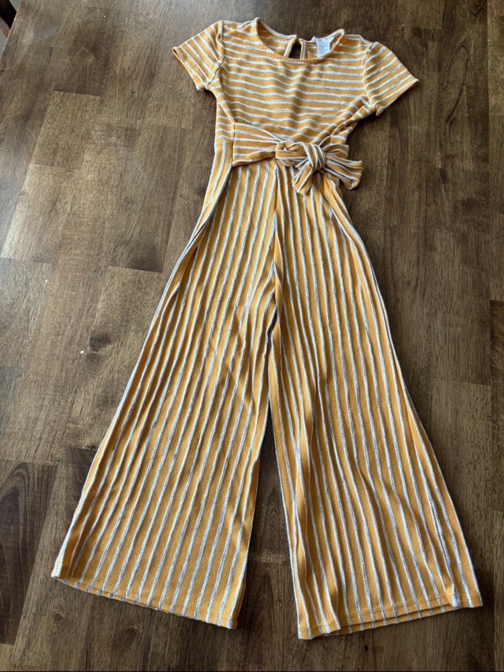 Beautees Mustard and Cream Striped Tie-Waist Wide-Leg Jumpsuit from Macy’s